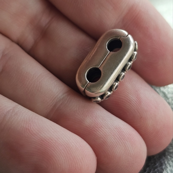 Pandora sterling silver charm. Authentic. Other sites list at $80. This is a goo - Picture 2 of 3